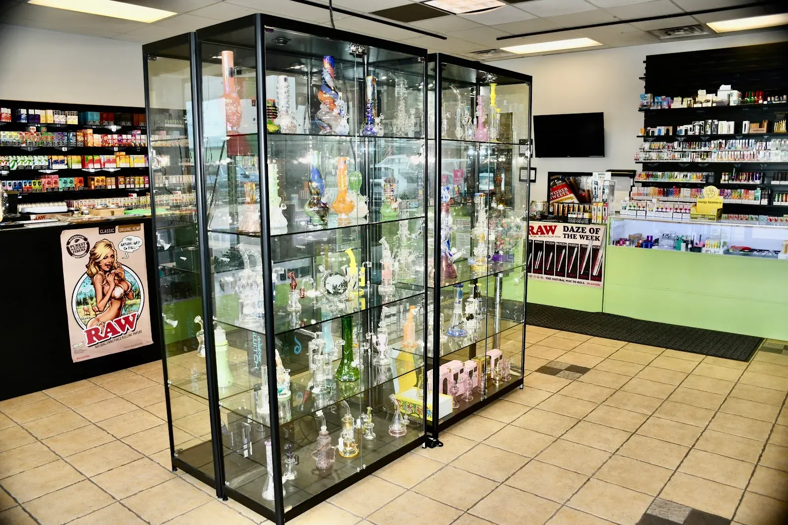 Interior view of the shop with multiple glass display cases.
