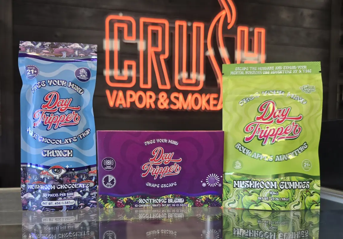 Day Tripper mushroom chocolate, nootropic tablets, and mushroom gummies lineup.